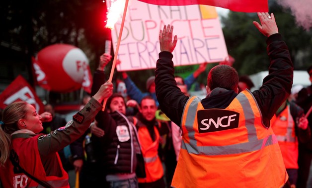 FILE PHOTO: French state-owned SNCF railway company employees and labour union members demonstrate as part of a nationwide strike in Paris, France, May 14, 2018. REUTERS/Benoit Tessier/File Photo
