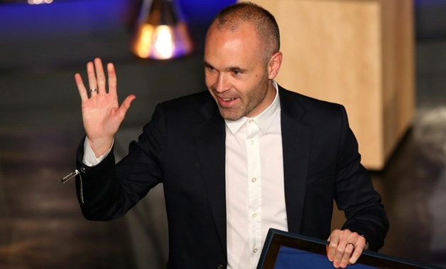 FILE PHOTO: Soccer Football - FC Barcelona Tribute to Andres Iniesta - Auditorium 1899, Barcelona, Spain - May 18, 2018 Andres Iniesta waves during the presentation REUTERS/Albert Gea
