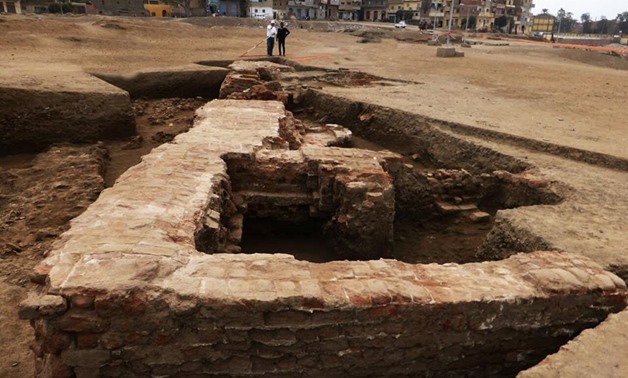 Egyptian archaeological mission at the Supreme Council of Antiquities has uncovered parts of a huge red brick building-Official Facebook Page