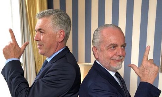 De Laurentiis (R) posing with Ancelotti (L) after signing the three-year coaching contract - Courtesy of Aurelio De Laurentiis Twitter account
