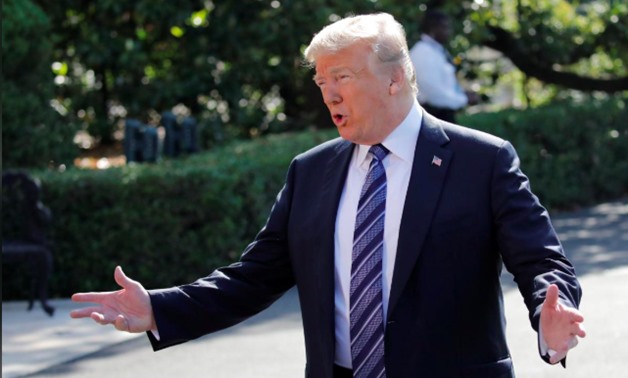 U.S. President Donald Trump said on Thursday he would decide whether to carry out his threat to hit Beijing with tariffs on at least $300 billion in Chinese goods after a meeting of leaders of the world's largest economies late this month.

