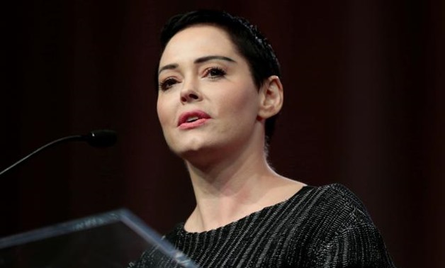 FILE PHOTO: Actor Rose McGowan addresses the audience during the opening session of the three-day Women's Convention at Cobo Center in Detroit, Michigan, U.S., October 27, 2017. REUTERS/Rebecca Cook.