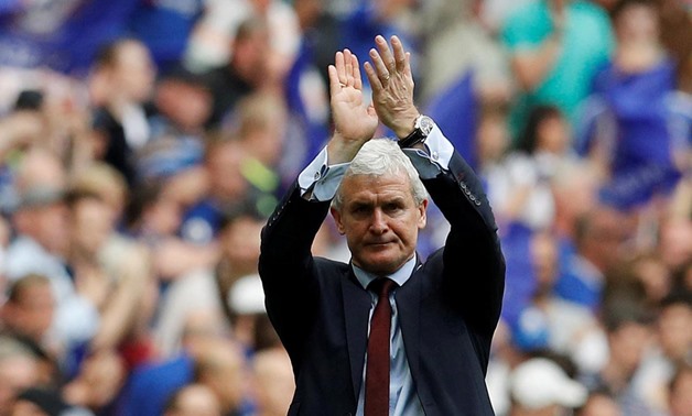 FILE PHOTO: Soccer Football - FA Cup Semi Final - Chelsea v Southampton - Wembley Stadium, London, Britain - April 22, 2018 Southampton manager Mark Hughes applauds fans after the match REUTERS/Darren Staples/File Photo

