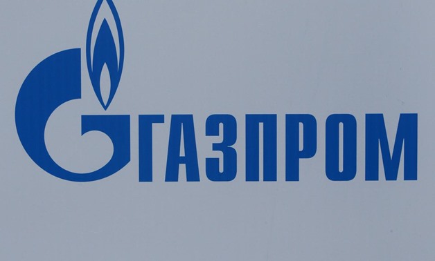 FILE PHOTO: The logo of Russian gas giant Gazprom is seen on a board at the St. Petersburg International Economic Forum 2017 (SPIEF 2017) in St. Petersburg, 
