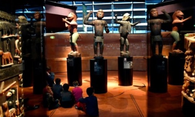 © AFP / by Katy Lee and Marie Wolfrom with AFP bureaux in Africa | African statues, plundered by French troops in 1892 from the kingdom of Dahomey -- modern-day Benin -- are displayed in Paris' Quai Branly museum
