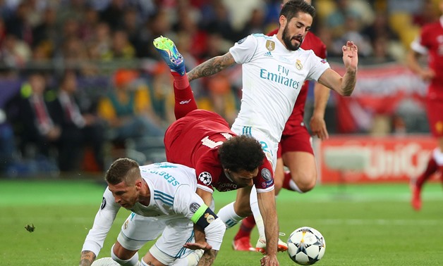 Soccer Football - Champions League Final - Real Madrid v Liverpool - NSC Olympic Stadium, Kiev, Ukraine - May 26, 2018 Real Madrid's Sergio Ramos in action with Liverpool's Mohamed Salah REUTERS/Hannah McKay