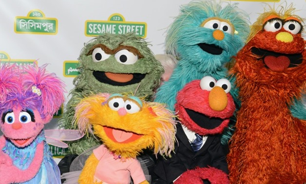 The creators behind "Sesame Street" are suing over a marketing campaign for a new bawdy puppet movie, on the grounds that it's confusing viewers into believing the film is connected to the beloved show for kids.
