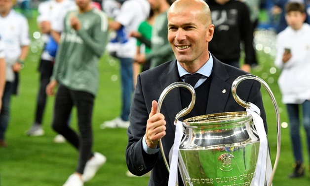 Zinedine Zidane with the Champions League trophy after Real Madrid's win against Liverpool in Saturday's final in Kiev
AFP / GENYA SAVILOV

