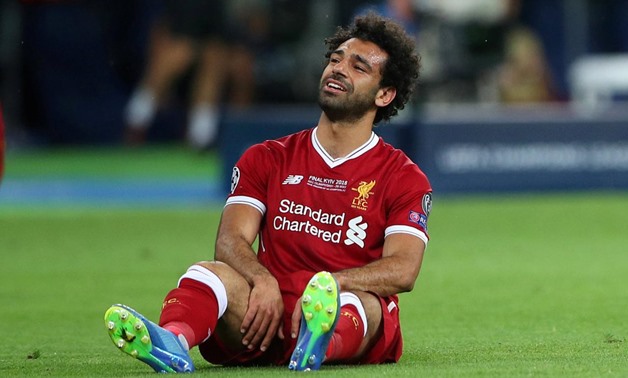 Soccer Football - Champions League Final - Real Madrid v Liverpool - NSC Olympic Stadium, Kiev, Ukraine - May 26, 2018 Liverpool's Mohamed Salah looks dejected after sustaining an injury REUTERS/Hannah McKay 
