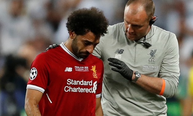 Soccer Football - Champions League Final - Real Madrid v Liverpool - NSC Olympic Stadium, Kiev, Ukraine - May 26, 2018 Liverpool's Mohamed Salah looks dejected as he is substituted off due to injury REUTERS/Andrew Boyers
