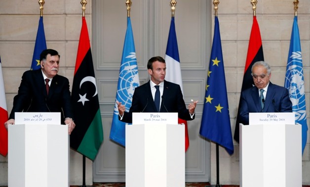 (From left) Libyan Prime Minister Fayez al-Sarraj, French President Emmanuel Macron and UN special envoy for Libya Ghassan Salame hold a press conference after four Libyan leaders agreed to hold elections in December
