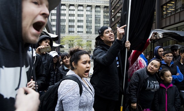  Protesters during a rally in Daley Plaza in Chicago - AFP 