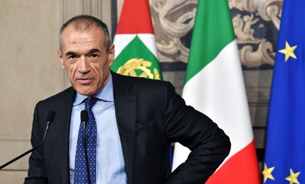 Carlo Cottarelli is charged with forming a caretaker government but populists have vowed to block it
