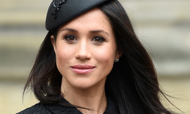 Meghan Markle, the fiancee of Britain's Prince Harry, attends a Service of Thanksgiving and Commemoration on ANZAC Day at Westminster Abbey in London, Britain, April 25, 2018. Eddie Mulholland/Pool via Reuters/File Photo
