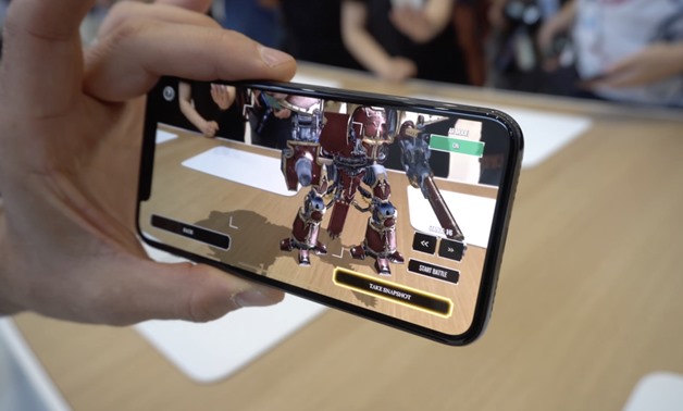 Apple to debut phone-to-phone augmented reality -sources - Reuters