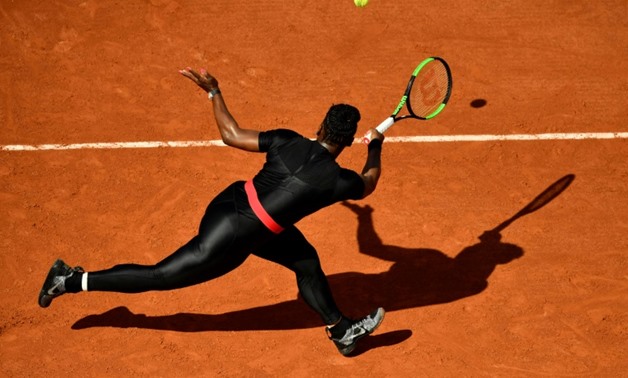 Back in black: Serena Williams in action at Roland Garros
AFP / CHRISTOPHE SIMON
