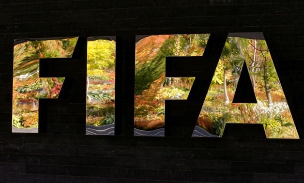 FILE PHOTO: FIFA's logo is seen in front of its headquarters during a meeting of the FIFA executive committee in Zurich, Switzerland September 25, 2015. REUTERS/Arnd Wiegmann

