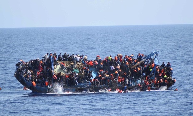 FILE-  Overcrowded boat capsized off the coast of Libya in May, 2016 - Reuters