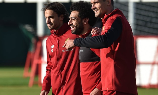 FILE- Lazar Markovic, Mohamed Salah and Dejan Lovren during a training session with Liverpool 