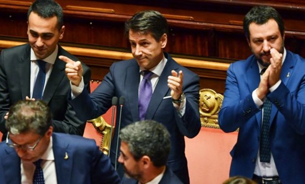 © Andreas Solaro, AFP | Italy's new PM Giuseppe Conte, flanked by his two powerful deputies Luigi Di Maio (left) and Matteo Salvini (right).
