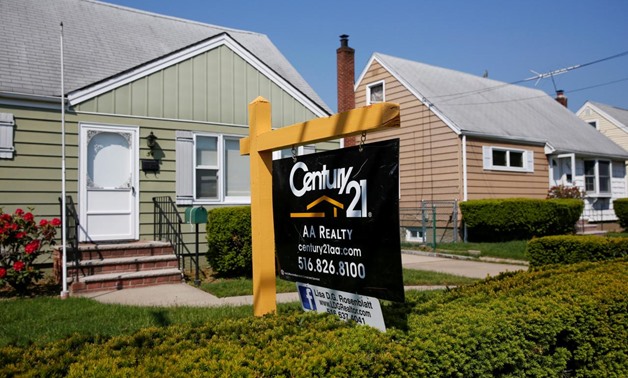FILE PHOTO: A 'House For Sale' sign is seen outside a single family house in Uniondale, New York, U.S., May 23, 2016. REUTERS/Shannon Stapleton/File Photo
