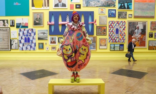 Artist and coordinator of the Royal Academy of Arts 250th Summer Exhibition, Grayson Perry, poses for a photograph at the press launch of the exhibition in the Royal Academy.