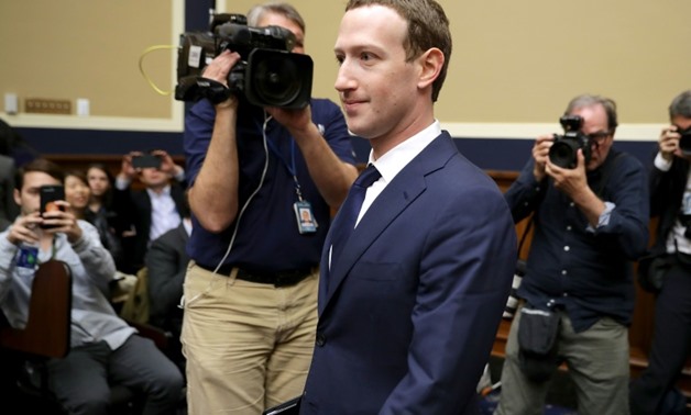 Some lawmakers say Facebook CEO Mark Zuckerberg, seen here at an April congressional hearing on personal data protection, should return to explain its deal allowing smartphone makers to access user information

