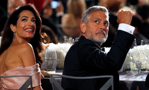 Actor George Clooney and his wife Amal attend the 46th AFI Life Achievement Award in Los Angeles, California, U.S., June 7, 2018. Picture taken June 7, 2018. REUTERS/Mario Anzuoni
