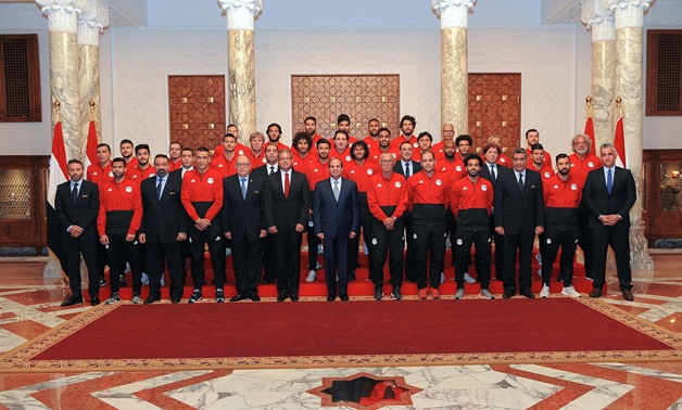 FILE - President Abdel-Fatah al-Sisi meets the Egyptian national team’s players and coaching staff