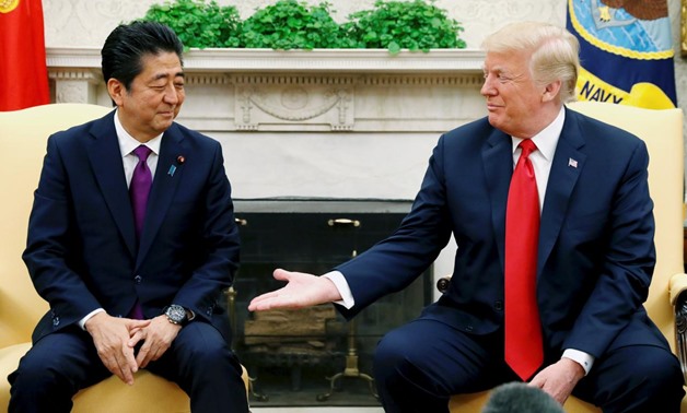 FILE PHOTO: U.S. President Donald Trump meets with Japanese Prime Minister Shinzo Abe in the Oval Office of the White House in Washington, U.S., June 7, 2018. REUTERS/Kevin Lamarque/File Photo
