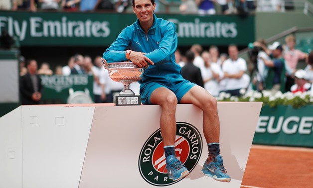 Tennis - French Open - Roland Garros, Paris, France - June 10, 2018 Spain's Rafael Nadal celebrates with the trophy after winning the final against Austria's Dominic Thiem REUTERS/Benoit Tessier
