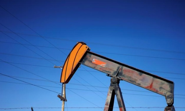 FILE PHOTO: An oil well pump jack is seen at an oil field supply yard near Denver, Colorado, U.S., February 2, 2015. REUTERS/Rick Wilking/File Photo
