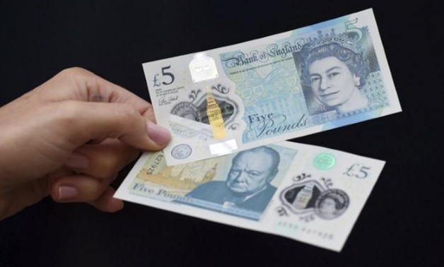 The new polymer 5 pound Sterling note featuring Sir Winston Churchill, is unveiled at Blenheim Palace in Oxfordshire, Britain June 2, 2016. REUTERS/Joe Giddens/Pool
