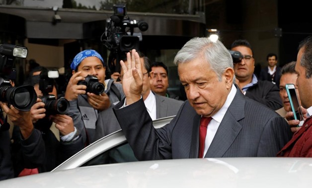Andres Manuel Lopez Obrador, presidential pre-candidate of the National Regeneration Movement (MORENA), leaves an event during which he unveiled his anti-corruption plan he will put in place if he wins this year's election, in Mexico City, Mexico January 