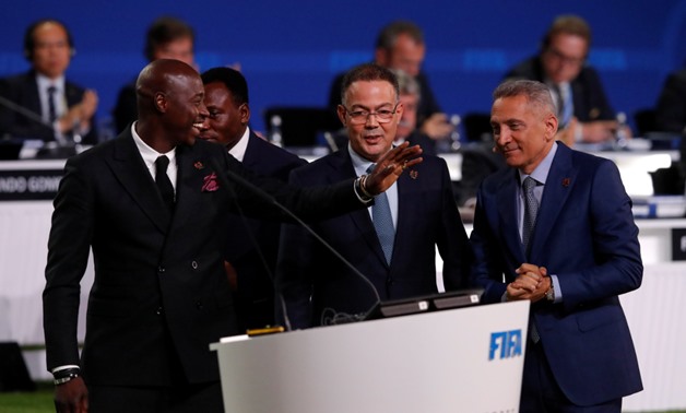Officials, led by Chairman of the 2026 Morocco Bid Committee for the 2026 FIFA World Cup Moulay Hafid Elalamy (R), take part in a presentation during the 68th FIFA Congress in Moscow, Russia June 13, 2018. REUTERS/Sergei Karpukhin
