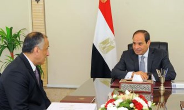 President Abdel Fatah al-Sisi during a meeting with Governor of the Central Bank of Egypt (CBE) Tareq Amer on Wednesday - Press Photo 