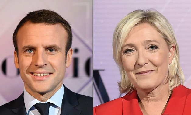 The latests show Macron (L) holding a hefty but narrowing lead over Le Pen (R) in the polls of 59 percent to 41 percent /Reuters
