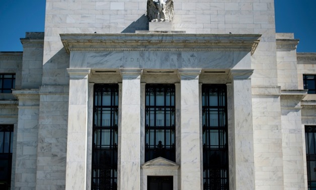 A unanimous vote from the US Federal Reserve to raise the benchmark lending rate brings the federal funds rate to a range of 1.75-2.0 percent,but the quarterly economic forecasts show central bankers now expect the rate to end the year at 2.4 percent
