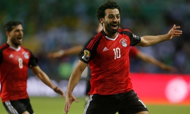 Mohamed Salah celebrates scoring against Burkina Faso - Reuters 