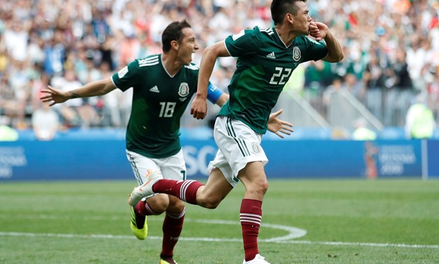 Soccer Football - World Cup - Group F - Germany vs Mexico - Luzhniki Stadium, Moscow, Russia - June 17, 2018 Mexico's Hirving Lozano celebrates scoring their first goal with Andres Guardado REUTERS/Carl Recine
