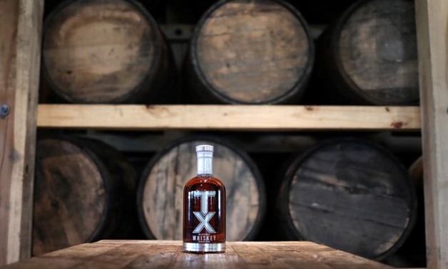 A bottle of TX Whiskey is photographed in the TX Tavern at the Firestone & Robertson (F&R) Whiskey Ranch in Forth Worth, Texas, U.S., May 24, 2018. Picture taken May 24, 2018. REUTERS/Adrees Latif

