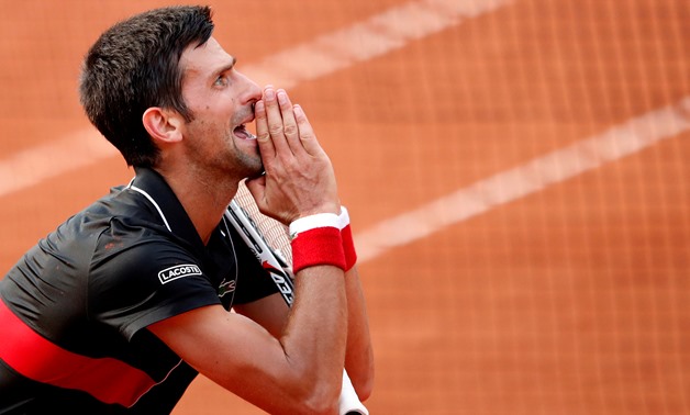 Tennis - French Open - Roland Garros, Paris, France - June 5, 2018 Serbia's Novak Djokovic reacts during his quarter final match against Italy's Marco Cecchinato REUTERS/Pascal Rossignol TPX IMAGES OF THE DAY
