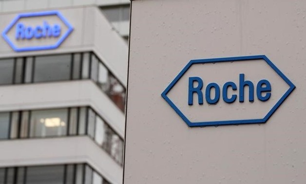 The logo of Swiss drugmaker Roche is seen at its headquarters in Basel, Switzerland February 1, 2018. REUTERS/Arnd Wiegmann
