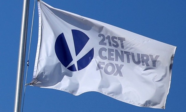 FILE PHOTO: The Twenty-First Century Fox Studios flag flies over the company building in Los Angeles, California U.S. November 6, 2017. REUTERS/Lucy Nicholson/File Photo