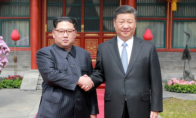 North Korean leader Kim Jong Un went to Beijing looking for a big-brother type and found one in Chinese President Xi Jinping. (KCNA/Reuters)
