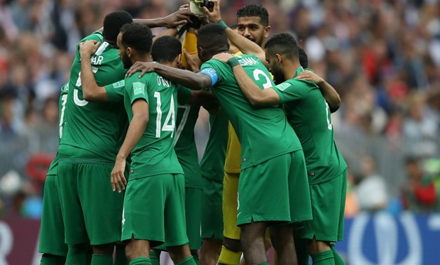 Saudi Arabia team huddle before the match against Russia . REUTERS/Carl Recine