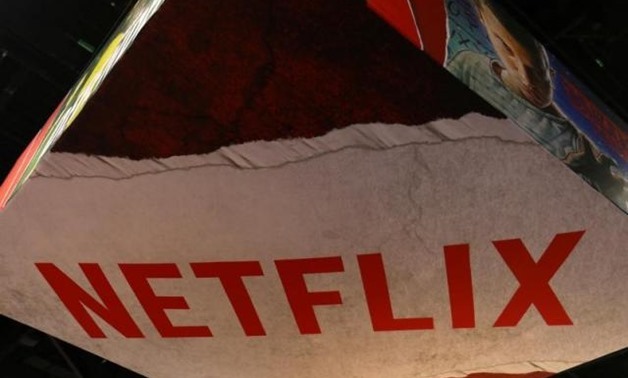 The Netflix logo is shown above their booth at Comic Con International in San Diego, California, U.S., July 21, 2017. REUTERS/Mike Blake.

