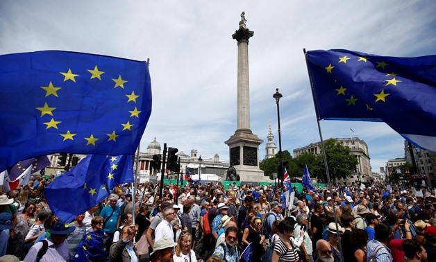 EU supporters, calling on the government to give Britons a vote on the final Brexit deal, walk through Trafalgar Square in the 'People's Vote' march in central London, Britain June 23, 2018. REUTERS/Henry Nicholls
