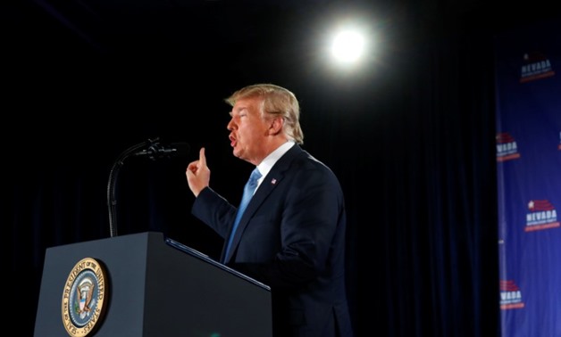 Trump defends policies on border, North Korea in visit to Las Vegas - Reuters