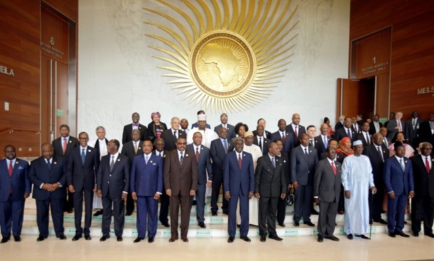 African heads of states pose for a group photo during the opening ceremony of an African Union session in Addis Ababa, Ethiopia July 3, 2017 [Tiksa Negeri/Reuters]


